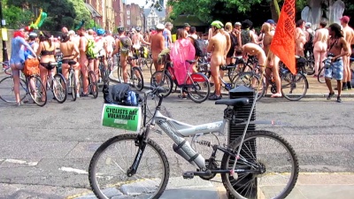 Bike decorated with slogan sign and flag - WNBR London 2016